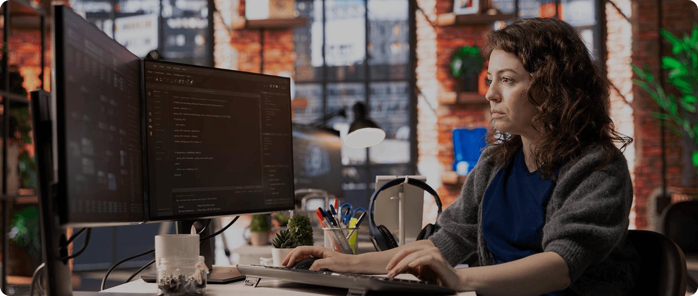 Deskrive Care team providing technical support to clients from a modern office