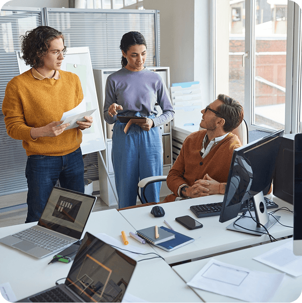 Deskrive Labs product team collaborating in a bright office